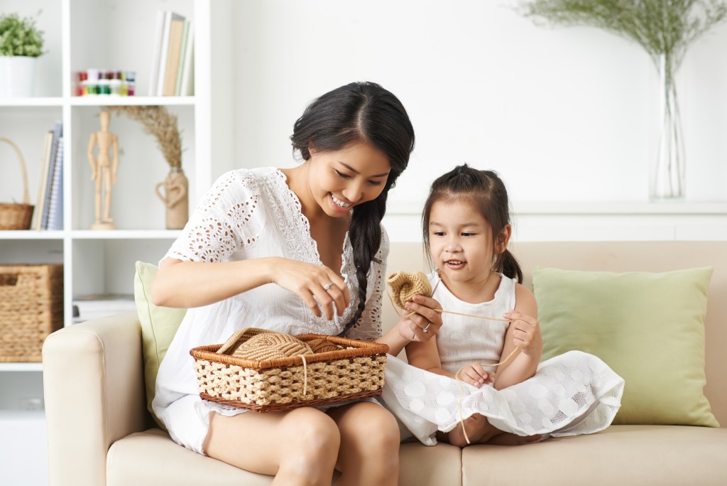 mom and daughter knitting