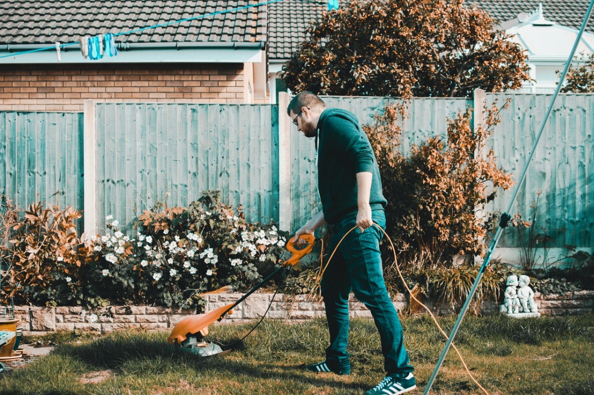 man mowing