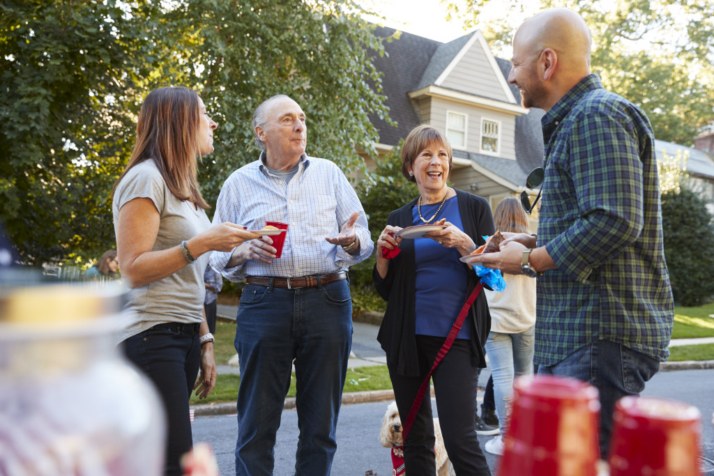 seniors talking to their neighbors