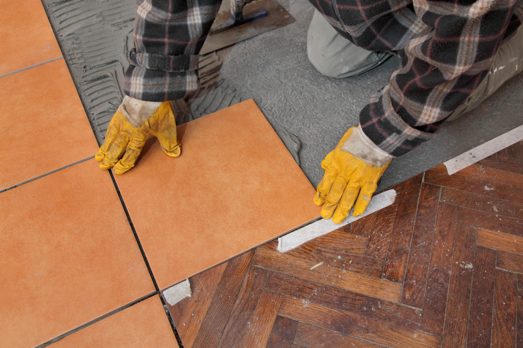 fitting tiles on a floor