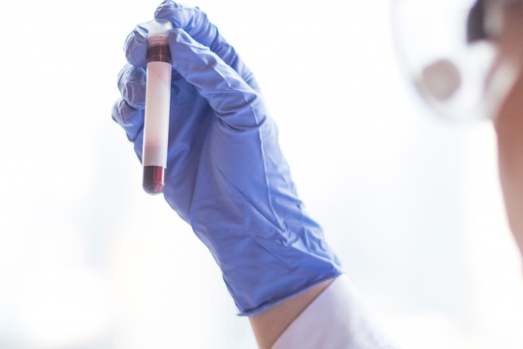 lab scientist holding test tube