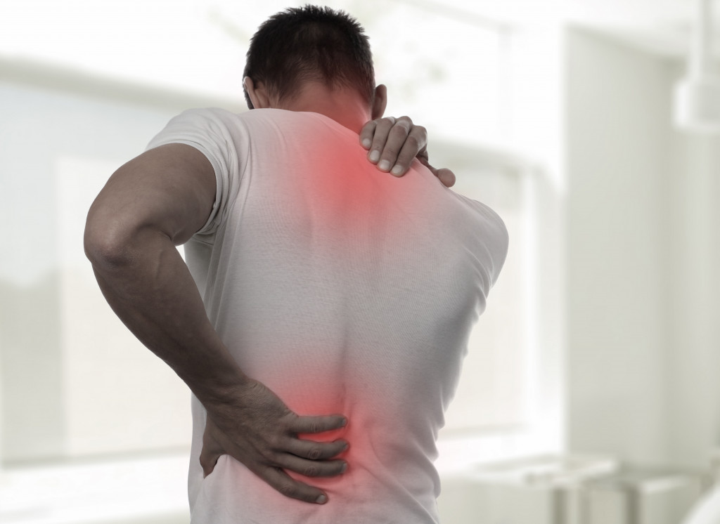 Back pain due to ALS