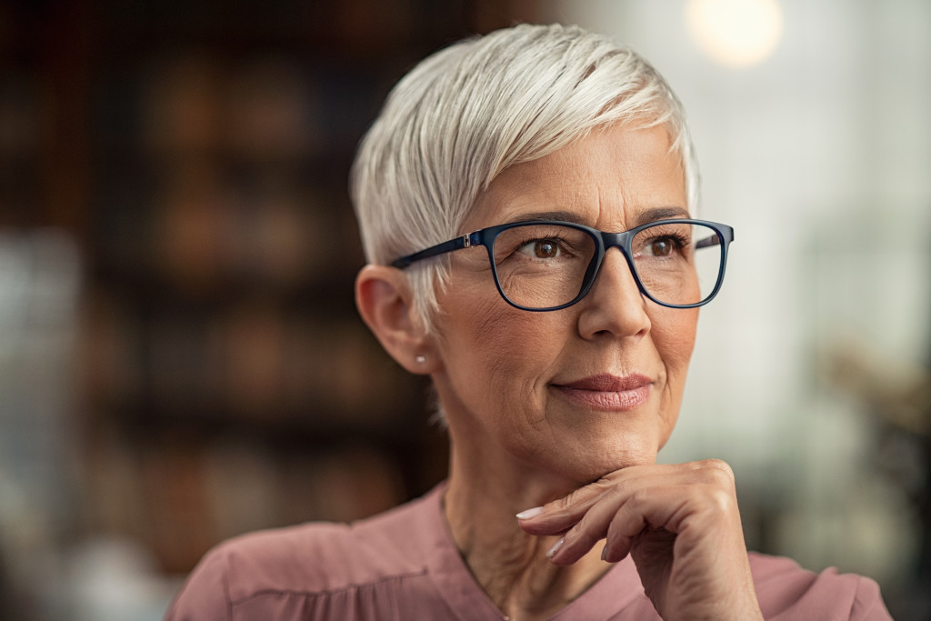 Wearing glasses aging woman