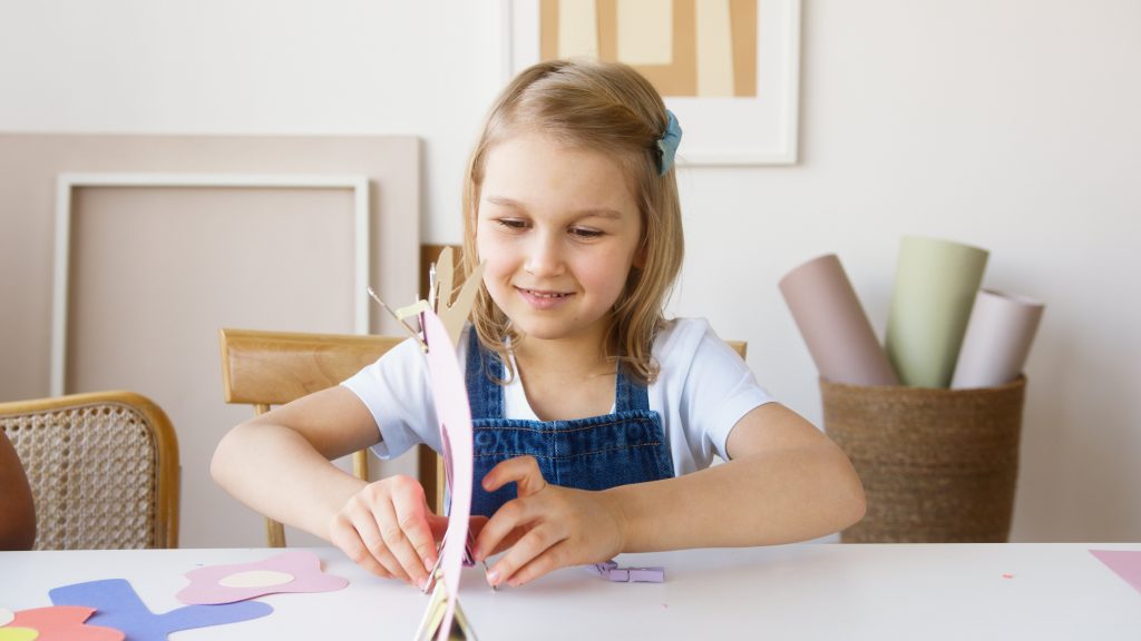 Young girl doing crafts